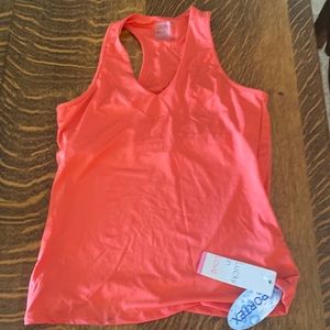 Lucky in Love tennis top.  Coral size M